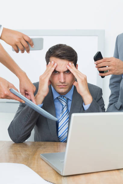 istock Worried businessman with head in hands 845577250