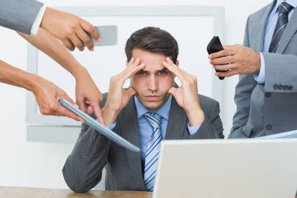 istock Worried businessman with head in hands 845577292