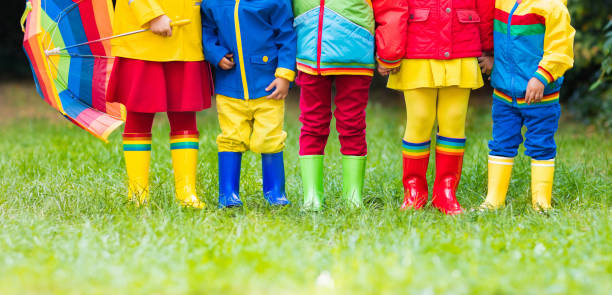 istock Kids in rain boots. Rubber boots for children. 845583436