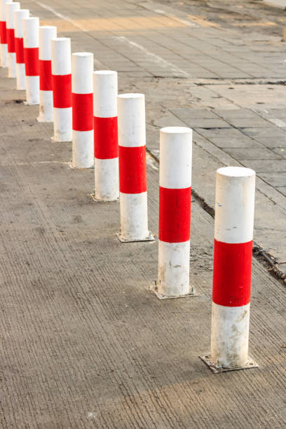 istock Road block pole in straight line 845585904