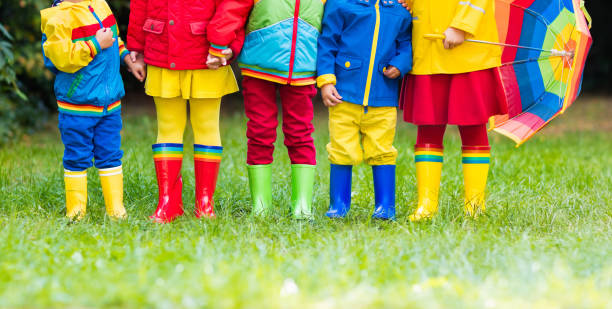 istock Kids in rain boots. Rubber boots for children. 845586354