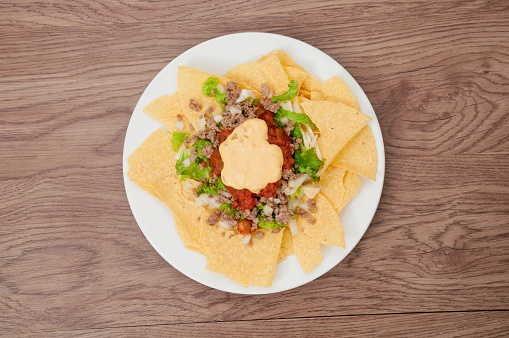 Nachos with Three Kinds of Salsas Isolated on White Background.
