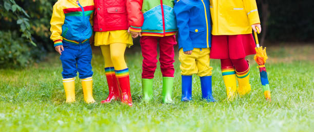 istock Kids in rain boots. Rubber boots for children. 845586634