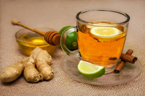 istock Cup of ginger tea with honey, ginger and lime 845592246