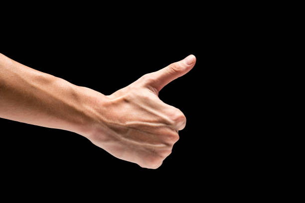 istock Male hand on a black background. 845593898