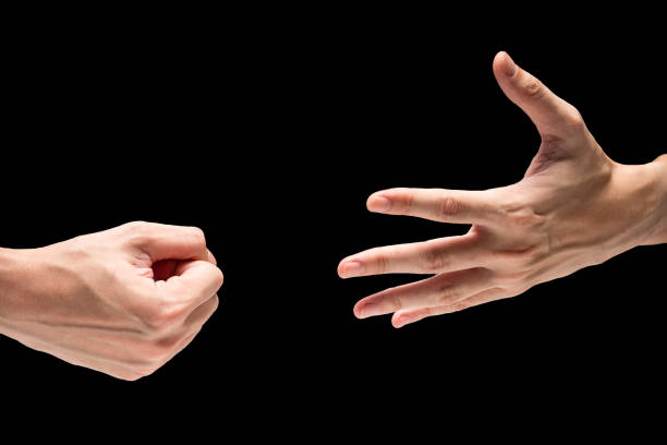 istock Hand symbol with rock paper scisors on a black background. 845593912
