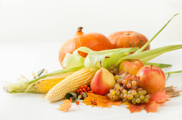 istock Pumpkins,apples, corn, pear, grapes with autumn leaves 845594904