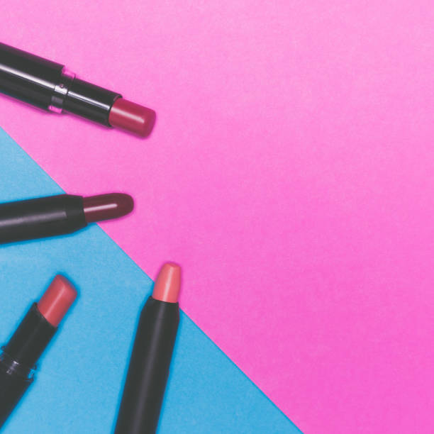 istock Lipsticks on colorful background.  Makeup and Beauty concept 845594944