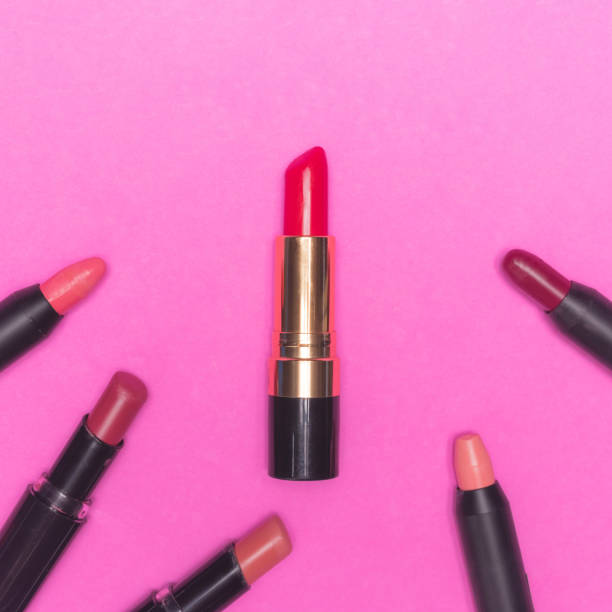 istock Lipsticks on pink background.  Makeup and Beauty concept 845594964
