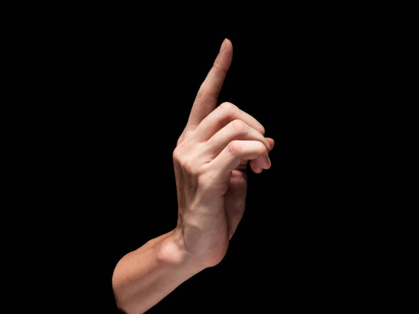istock Male hand on a black background. 845595240