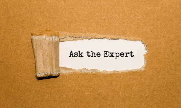 istock The text Ask the Expert appearing behind torn brown paper 845595574