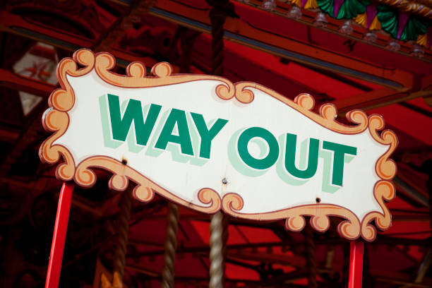 istock 'Way Out' sign on a fairground ride 845596072