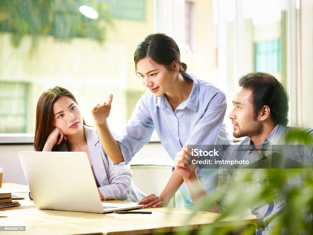 asian business people meeting in office young asian corporate executives meeting in office discussing business targets. Asia Stock Photo