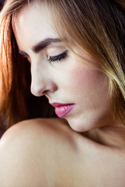 istock Pretty blonde woman closing her eyes 845599916