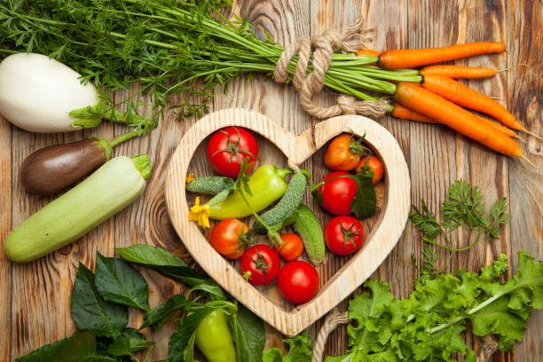 istock Raw vegetables on a wooden background 845605544