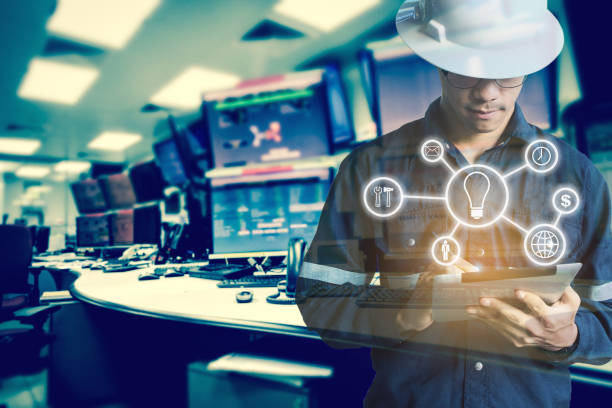 istock Double exposure of Engineer or Technician man with business industrial tool icons while using tablet with monitor of computers room  for oil and gas industrial business concept. 845608954