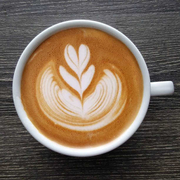 top view of a mug of latte art coffee. - coffee top view imagens e fotografias de stock