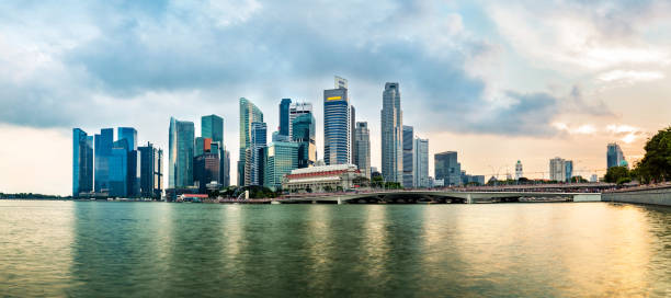 istock Singapore business district skyline during sunset. 845616258