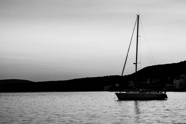 istock Sailing boat in a bay 845619726