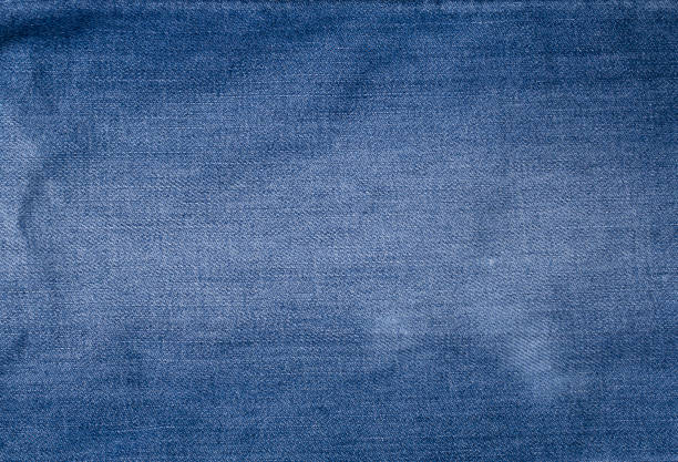 istock Blue denim texture with a stitch on the left, abstract background 845623058