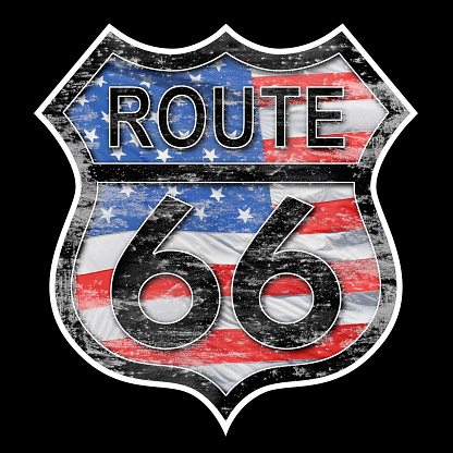 Highway sign for Route 66 isolated on black