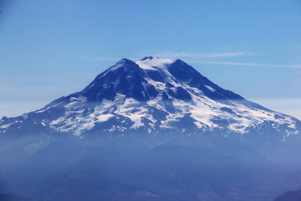 A view of Mt Rainier in the summer from an airplane