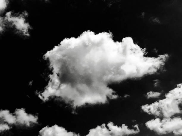 istock Isolated white clouds on black sky. Set of isolated clouds over black background. Design elements. White isolated clouds. Cutout extracted clouds. Black Background. 845649282