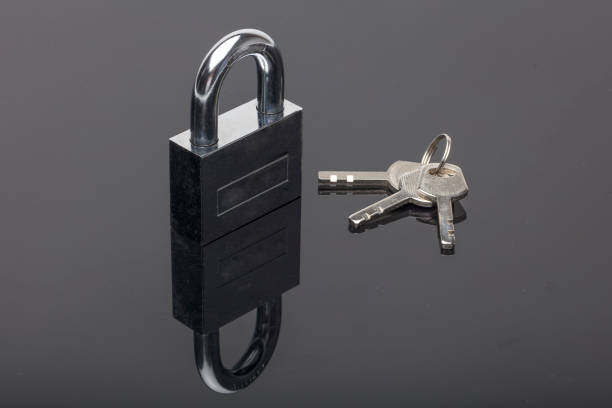 istock Unlocked Padlock And Key on a black background 845651012