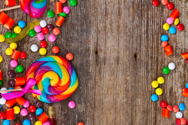 istock Colorful candies on wood 845663752