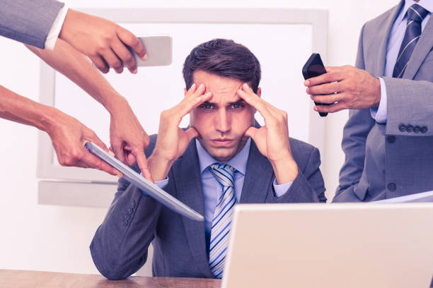 istock Worried businessman with head in hands 845666600