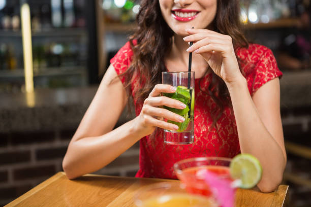 istock Pretty woman having a cocktail 845673172