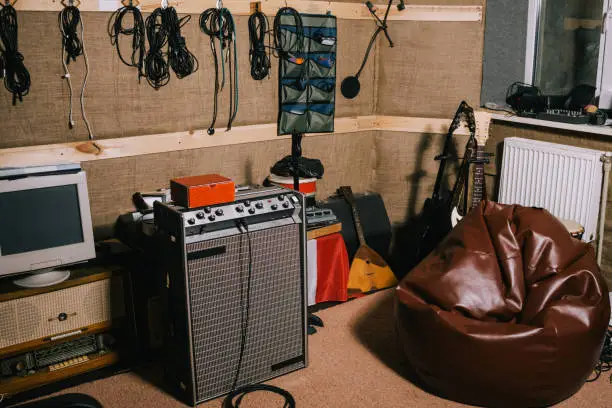 Old-fashioned recording studio with instruments. Hobby for hipsters in garage. Album making process, music concept