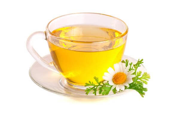 istock Herbal tea with fresh chamomile flowers isolated on white background 845673380