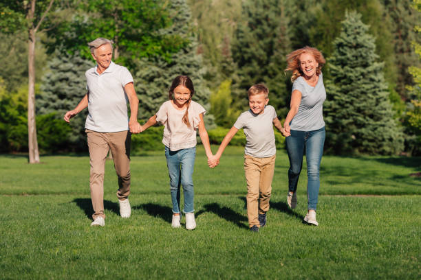 istock family running on meadow 845678312