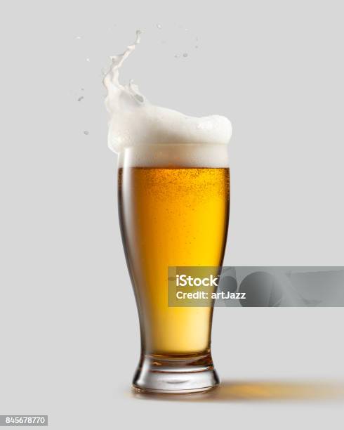 Frosty Glass Of Light Beer With Foam Stock Photo - Download Image Now - Beer - Alcohol, Splashing, Drinking Glass