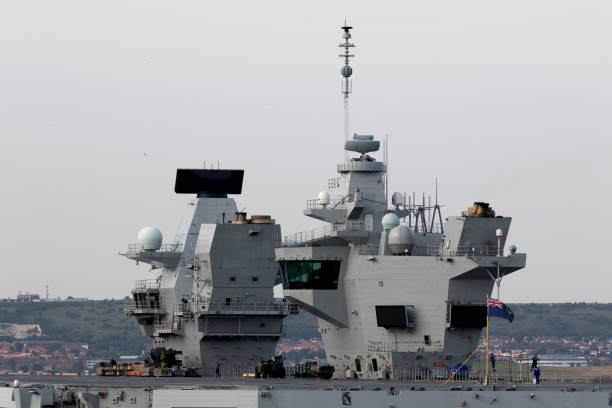 istock Aircraft Carrier in port 845678802