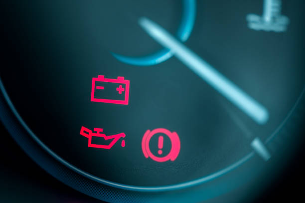 istock Close-up on car dashboard and warning icon 845681754