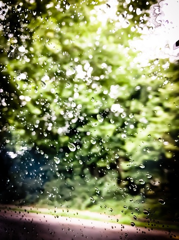 Rain Drops On The Car Window With Blurry Background Stock Photo - Download  Image Now - iStock