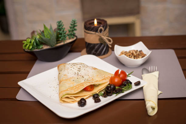 istock Delicious vegetarian pancakes close up with tomato vegetable and cheese 845688044