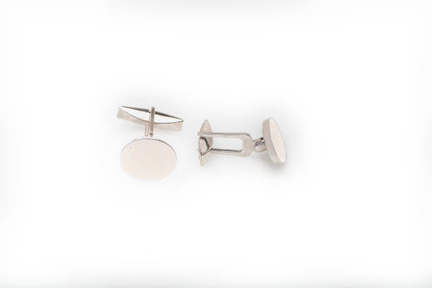silver cufflink isolated on white background - lapel brooch badge suit imagens e fotografias de stock