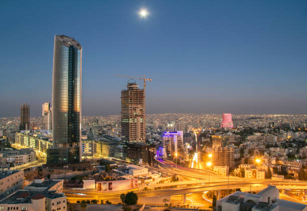 Top view of the new downtown of Amman Top view of the new downtown of Amman at night with moon amman city stock pictures, royalty-free photos & images