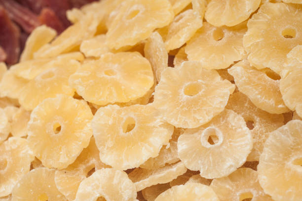 istock dried pineapple pile in store 845703828