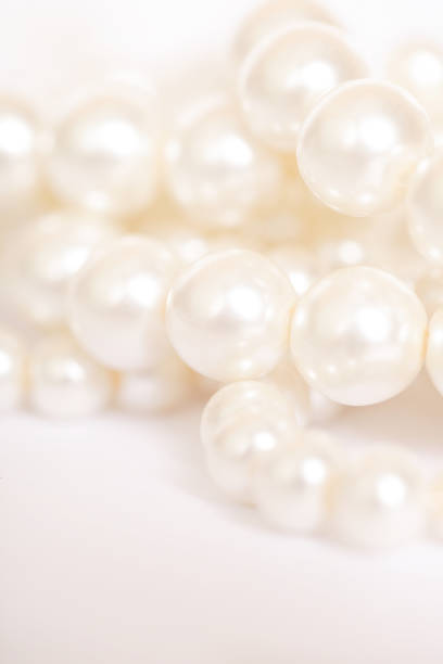 istock Pile of pearls on the white background 845708616