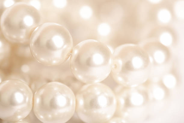 istock Pile of pearls on the white background 845708696