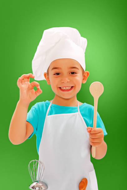 istock Cheerful little chef showing good taste 845708706