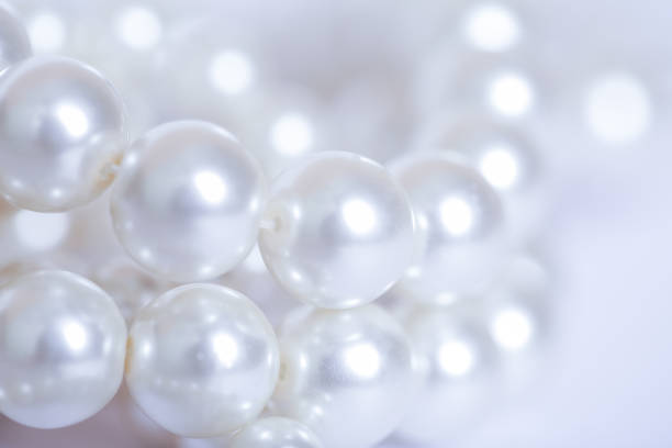 istock Pile of pearls on the white background 845708818