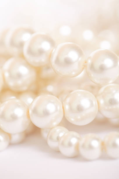 istock Pile of pearls on the white background 845709022