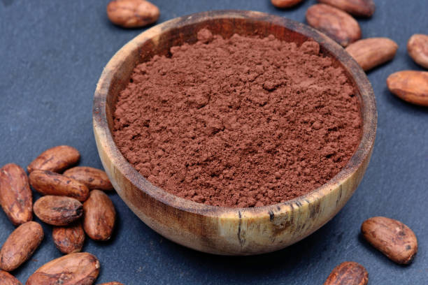 istock Bowl with cacao powder and beans on slate 845709050
