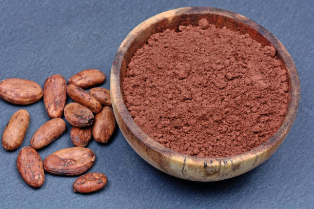istock Cacao beans with powder on slate 845709356