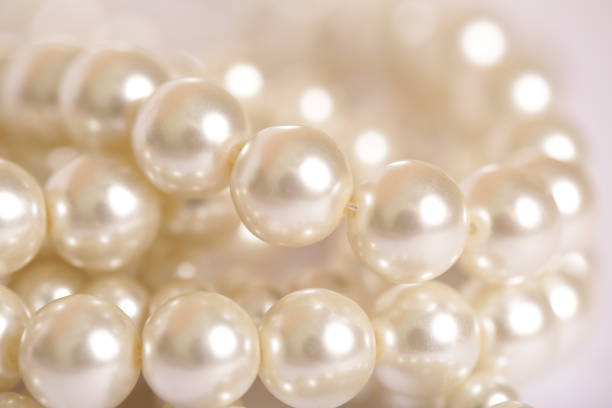 istock Pile of pearls on the white background 845709618